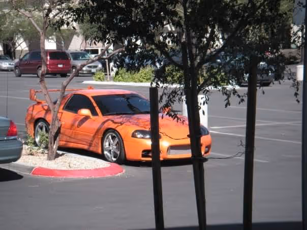 The Predator — orange sports car